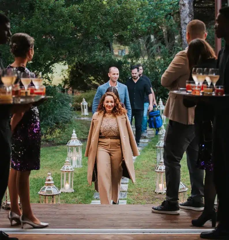 Guests arriving at an Amour evening reception