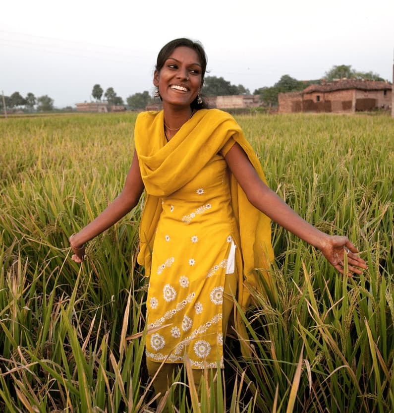 A young girl smiling