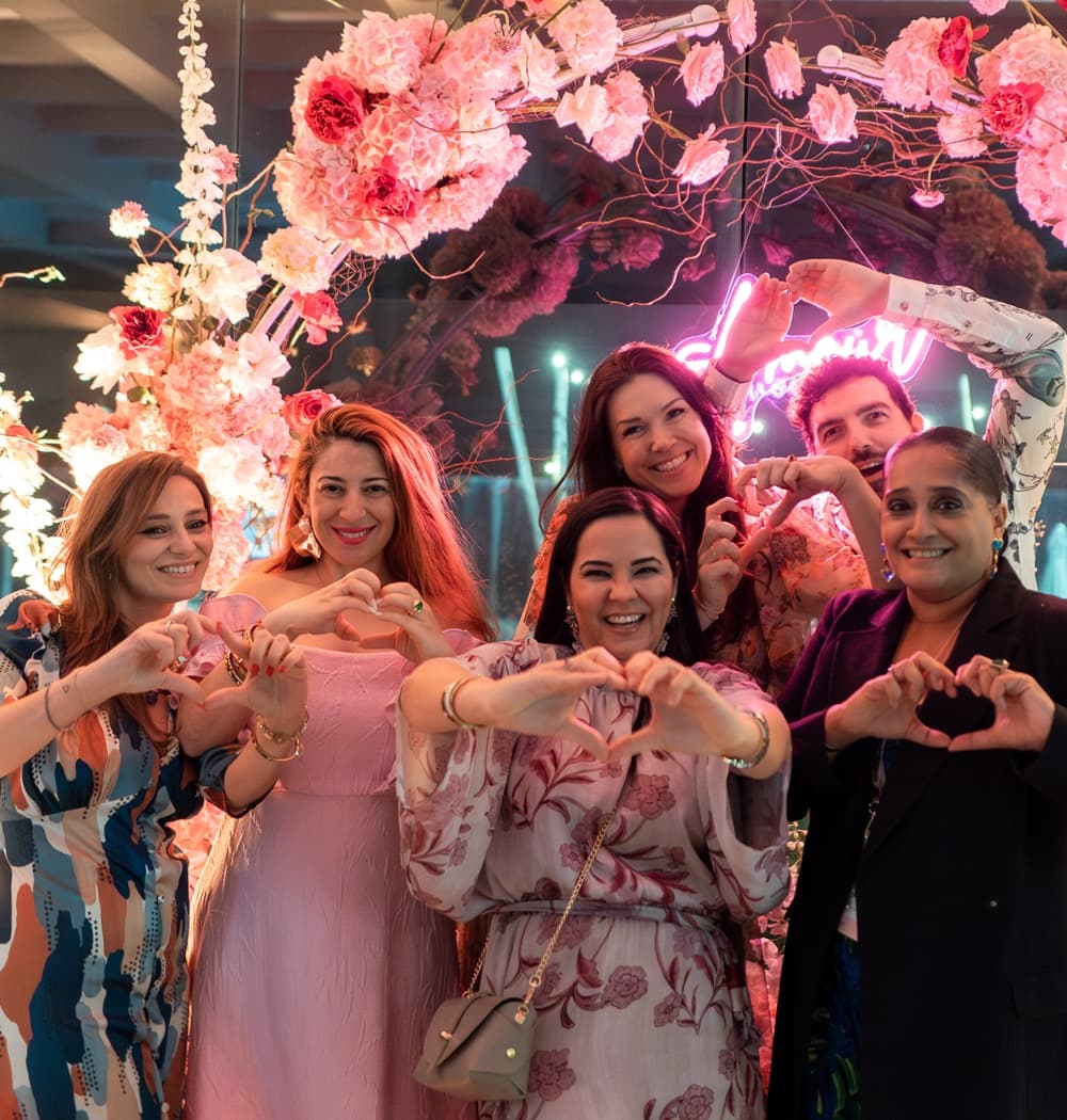 Photographer capturing guests at Amour